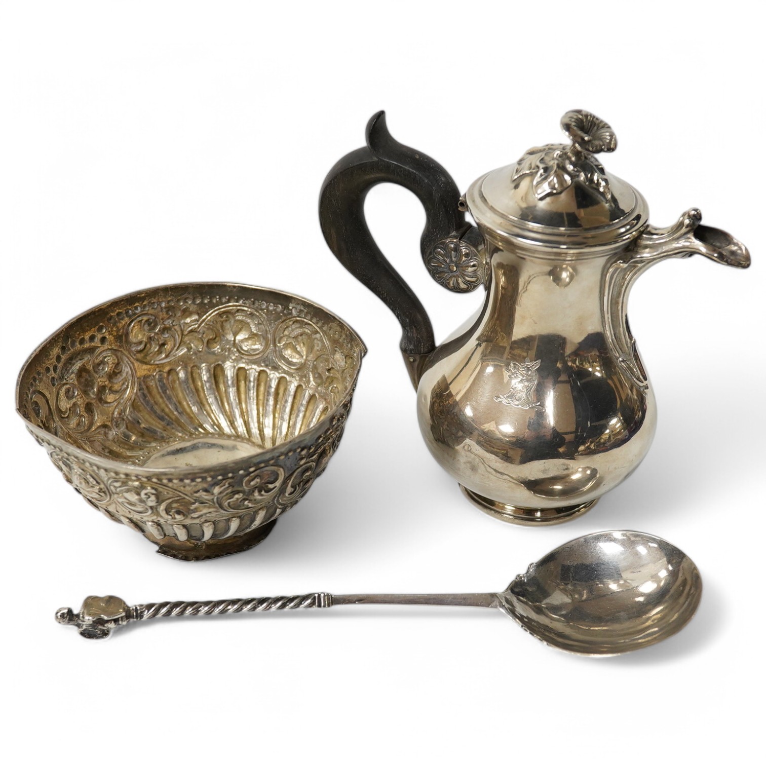 A small French white metal hot water pot, 13cm, a continental white metal bowl (a.f.) and a 19th century German white metal spoon. Condition - poor to fair